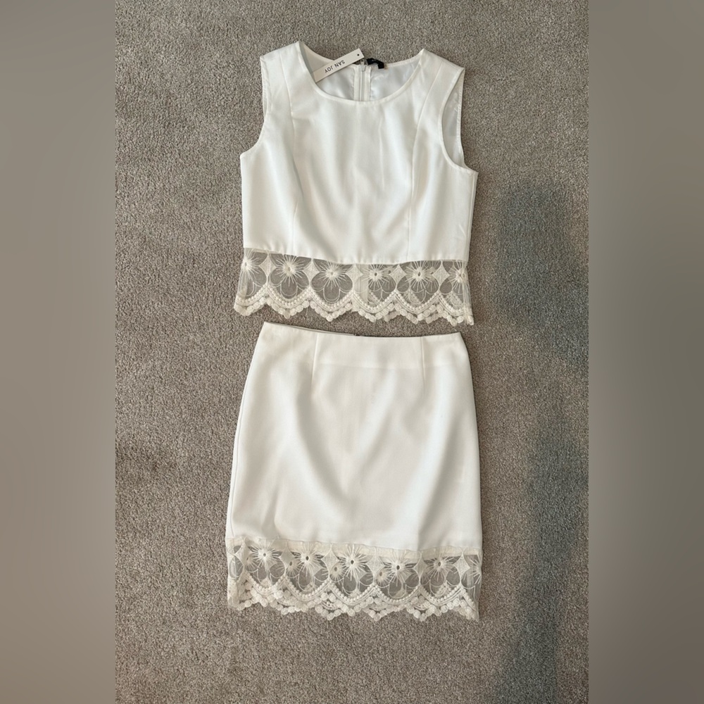 San Joy two piece set. Size M top and Size Small skirt. White. New with tags.